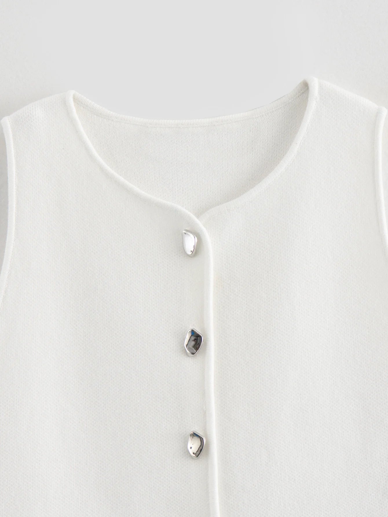 Gilet court en tricot rose sans manches pour femme