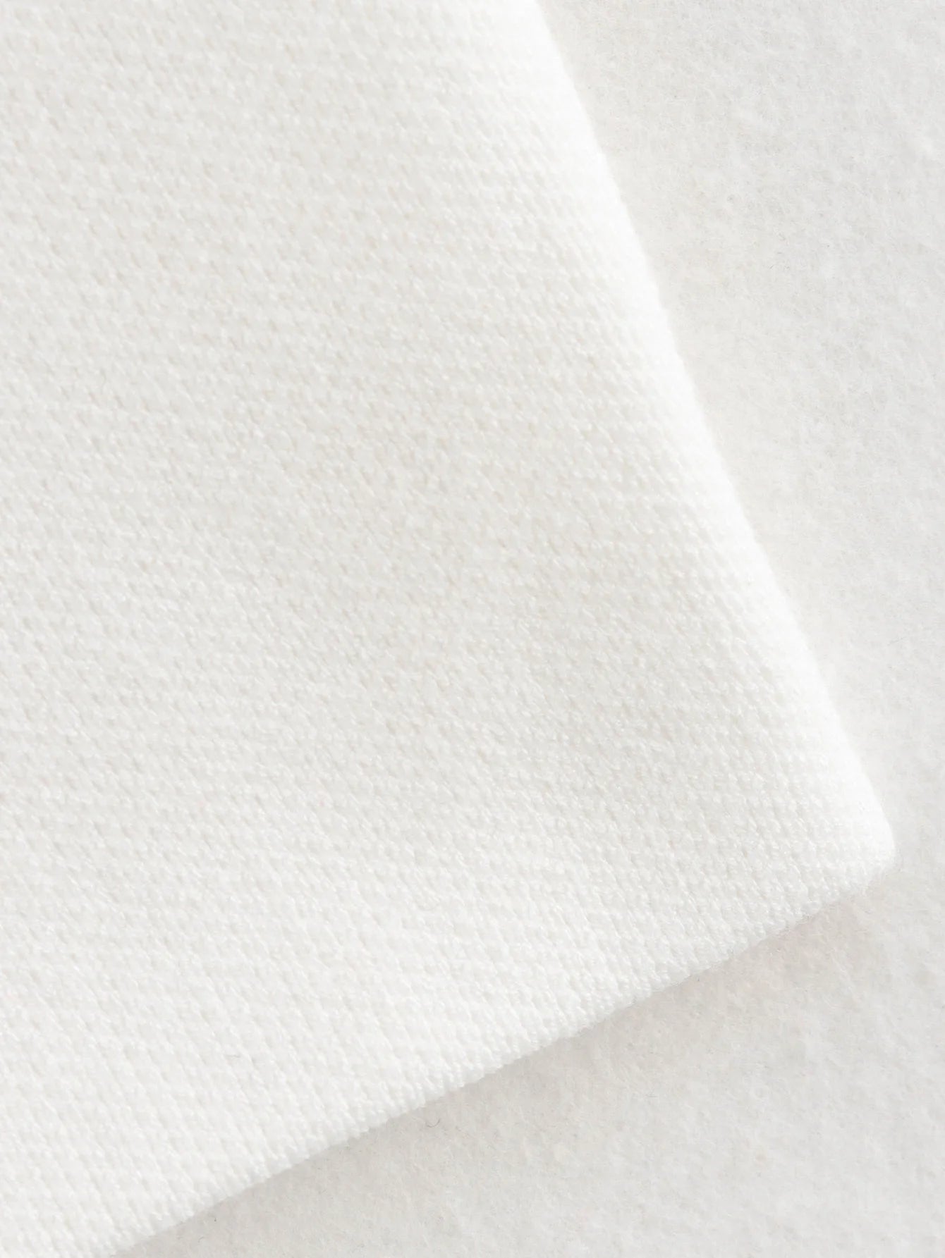 Gilet court en tricot rose sans manches pour femme