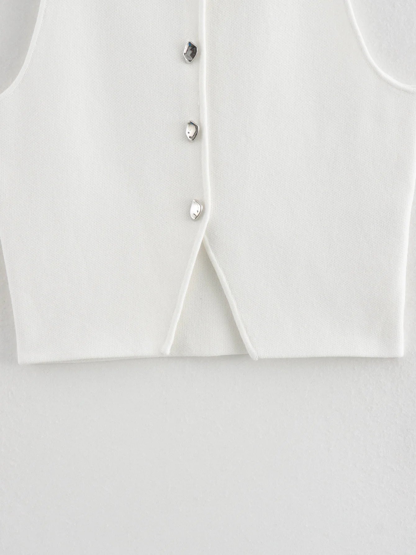 Gilet court en tricot rose sans manches pour femme